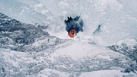 Conrad Anker climbs a wall covered in ice.  (Mandatory credit: Rocky Mountain Sherpas)