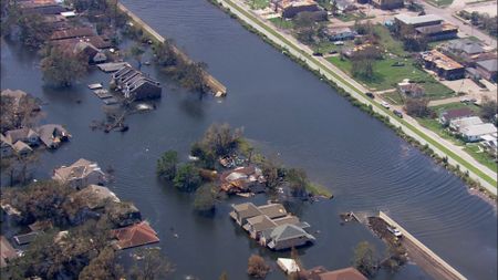 An aerial view of a broken levee after Hurricane Katrina. (Pond5)