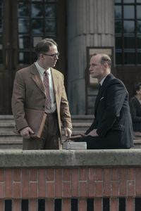A SMALL LIGHT - Jan Gies, played by Joe Cole, asks Bram, played by Jim High, for help as seen in A SMALL LIGHT. (Credit: National Geographic for Disney/Dusan Martincek)