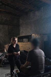 Mariana van Zeller discusses sextortion with Peter in Bulacan. (National Geographic for Disney)