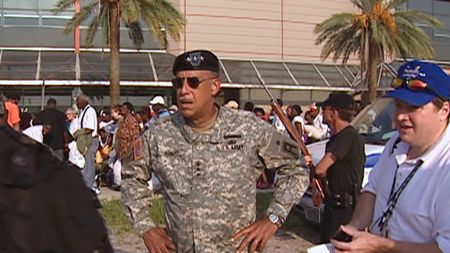 Commander of the Joint Task Force Katrina Lt. General Russel Honore stands outside of the crowded Convention Center in New Orleans, La., after Hurricane Katrina in 2005. (CNN)