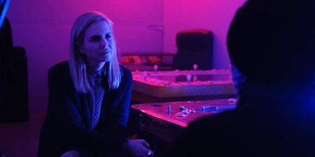 Mariana van Zeller interviews B in his hidden gambling location. (National Geographic for Disney)