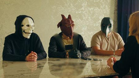 Mr. X, S and P sit for an interview with Mariana in Dubai. (Photo credit: National Geographic)