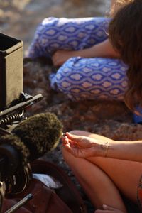 Mariana van Zeller sits with her best friend and cousin on the coast of Portugal. (National Geographic for Disney)