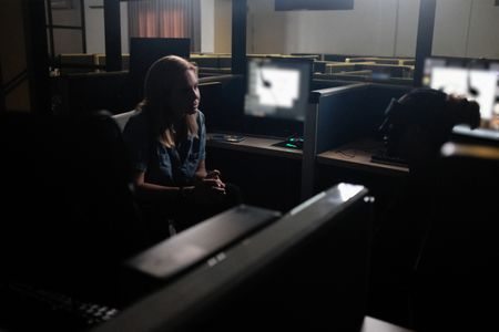 Mariana van Zeller discusses sextortion with Claudia in a call center in Bulacan. (National Geographic for Disney)