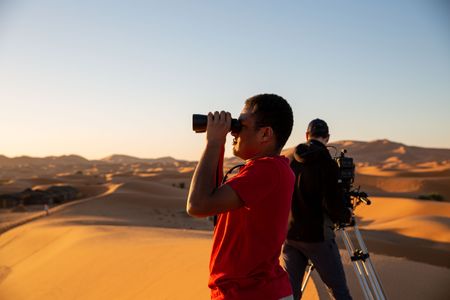 James Hanson and Lindsay McCrae search for swallows in the Moroccan desert. (National Geographic for Disney/Jonjo Harrington)