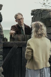 A SMALL LIGHT - Jan Gies, played by Joe Cole, inquires about the whereabouts of Liddy Cohen as seen in A SMALL LIGHT. (Credit: National Geographic for Disney/Dusan Martincek)