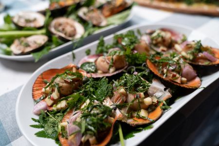 Iceland - Seared scallops with pickled rhubarb and apple salad. (Credit: National Geographic/Justin Mandel)