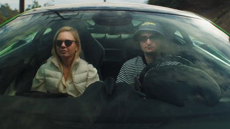 Mikki Mase drives Mariana van Zeller through the streets of Beverly Hills on their way to an illegal billionaires game. (National Geographic)