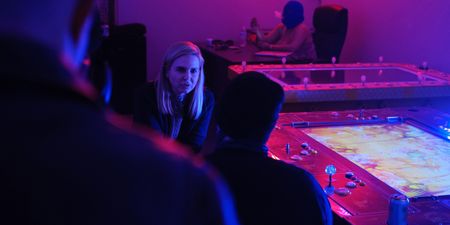 Mariana van Zeller interviews B in his hidden gambling location. (National Geographic for Disney)