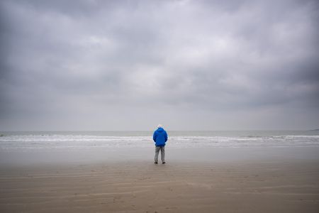 David Attenborough looks out to sea in Southern England. From National Geographic and Silverback and in association with All3Media International, documentary special OCEAN WITH DAVID ATTENBOROUGH highlights the vital, achievable actions the world can take to restore the ocean and stabilize the climate, debuting in 2025. (Photo by Conor McDonnell)