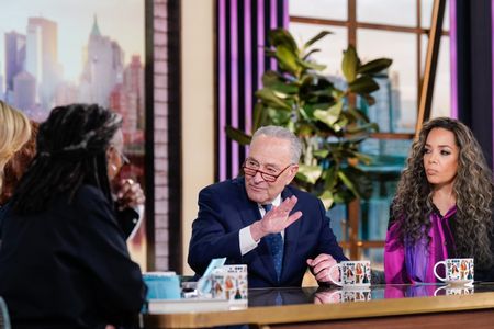 CHUCK SCHUMER, SUNNY HOSTIN