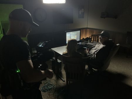 Mariana Van Zeller sits with Robert in his "command center." (National Geographic)