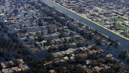 An aerial view of a broken levee after Hurricane Katrina. (Pond5)