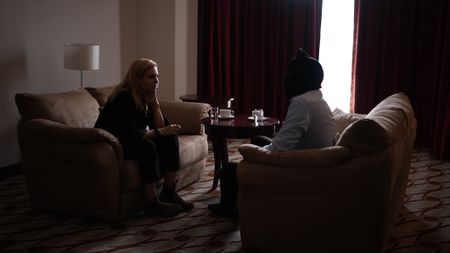 Mariana Van Zeller interviews 'Peter' in a small room in Nairobi.þ(National Geographic)