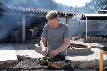 Oaxaca, Mexico - Gordon Ramsay seasoning Mole Negra during the final cook in Mexico. (Credit: National Geographic/Justin Mandel)
