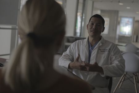 Mariana van Zeller (L) interviews Dr. Peter Chin-Hong. (Credit: National Geographic)