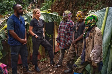 Mariana van Zeller speaks with the pygmy poachers deep in the forest in the Democratic Republic of the Congo. (National Geographic for Disney)