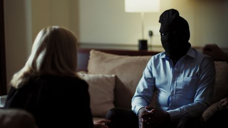 Mariana interviews a Kenyan underground surrogacy agent, Peter. (Photo credit: National Geographic)