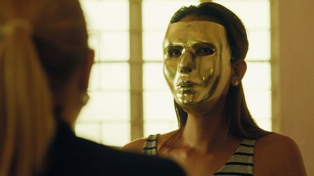 Mariana van Zeller speaks with Jamie, a sextortion scammer in the Philippines. (National Geographic for Disney)