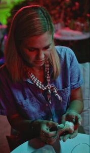 Mariana van Zeller holds a mushroom. (Credit: National Geographic)