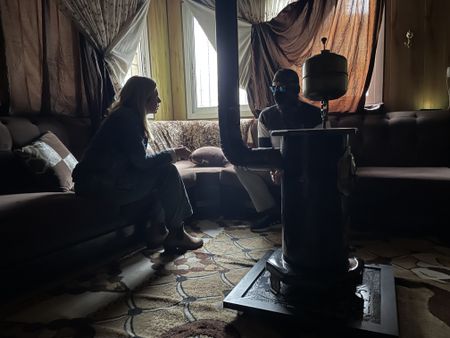 Mariana van Zeller (L) interviews Abu Ali, an oil smuggler. (Credit: National Geographic)