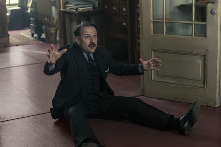 A SMALL LIGHT - Mr. Kugler, played by Nicholas Burns, tell the story of his escape as seen in A SMALL LIGHT. (Credit: National Geographic for Disney/Dusan Martincek)