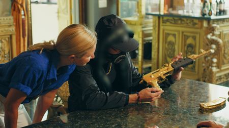 Mariana and Mr. X visit Johnny Dang's shop in Houston. (Photo credit: National Geographic)