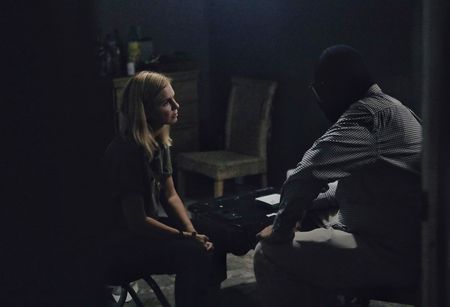 Mariana van Zeller (L) interviews "Angel", a man who recruits potential organ donors. (Credit: National Geographic)