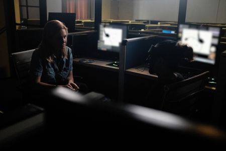 Mariana van Zeller discusses sextortion with Claudia in a call center in Bulacan. (National Geographic for Disney)