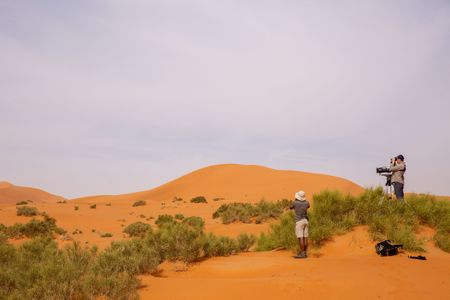 James Hanson and Lindsay McCrae search for swallows in the Moroccan desert. (National Geographic for Disney/Jonjo Harrington)