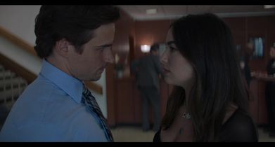 Elena and Scott argue at the precinct