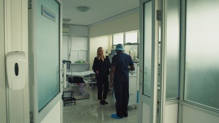 Mariana questions Dr. Noreh regarding illegal underground surrogacy in Kenya. (Photo credit: National Geographic)