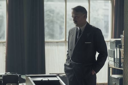 A SMALL LIGHT - Nicholas Burns as Mr. Kugler in A SMALL LIGHT. (Credit: National Geographic for Disney/Dusan Martincek)