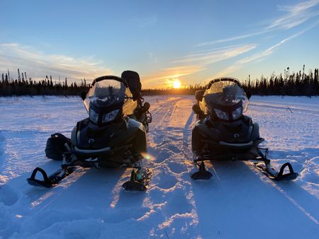 The team use Skidoos to travel through difficult frozen terrain. (National Geographic for Disney/Duncan Chard)