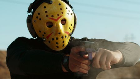 Dutch fires a ghost gun using his off hand finger to pull the trigger. (National Geographic)