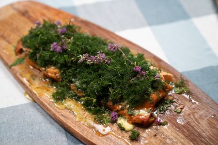 Iceland - Grilled salmon finished with a beautiful herb salad. (Credit: National Geographic/Justin Mandel)