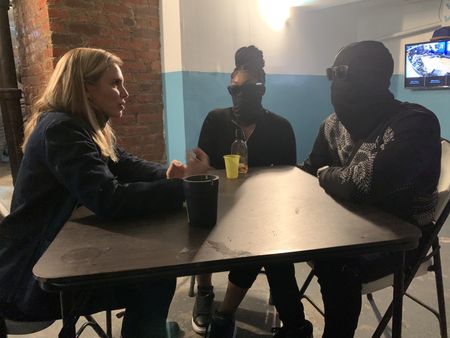 Mariana van Zeller interviews Ray Ray at his gambling location. (National Geographic for Disney)