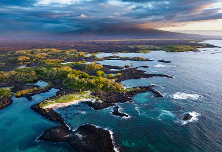 An aerial shot of a small part of Isla Isabela in the Galapagos Islands at sunset.  (credit:  National Geographic/Bertie Gregory)