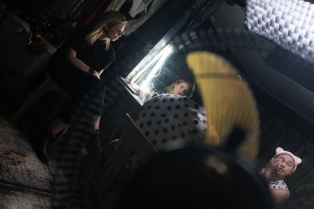 Mariana van Zeller discusses sextortion with Yumi. (National Geographic for Disney)