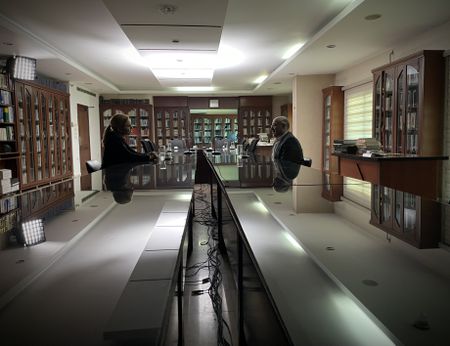 Mariana van Zeller (L) sits for her interview with Dr. Fadlallah (R). (Credit: National Geographic)