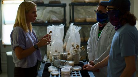 Mariana holds a psychedelic mushroom during interview with Jay and GOAT. (National Geographic)