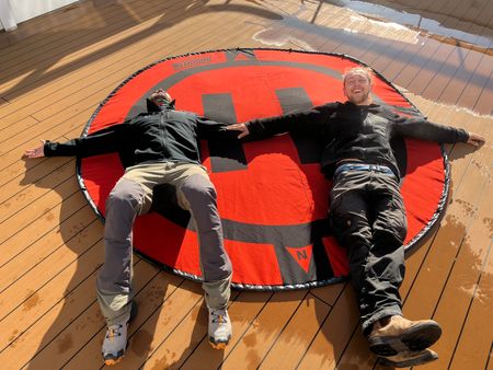 Ornithologist Dr. Javier Cotin and Drone Operator Raphael Boudreault-Simard replicate the wingspan of an albatross. (National Geographic for Disney/Ruth Davies)