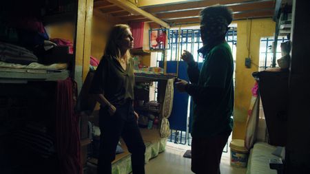 Mariana van Zeller interviews Diego, a man arrested for sextortion scamming in the Philippines. (National Geographic for Disney)