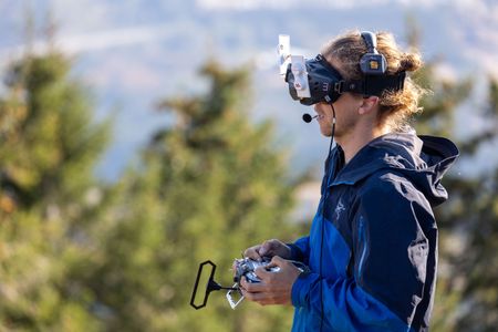 Drone operator Raphael Boudreault-Simard flies an FPV drone. (National Geographic for Disney/Maia Sherwood-Rogers)