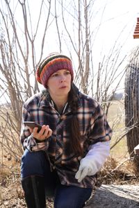 Beth Pol calls Dr. Meghan Milbrath, a bee expert, to get some advice on how to best set up the Pol family's bee colony that survived the winter. (National Geographic)