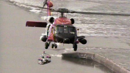 A helicopter carrying a rescued New Orleans resident takes flight during the aftermath of Hurricane Katrina in 2005. (FOX Archives/FOX News Channel)